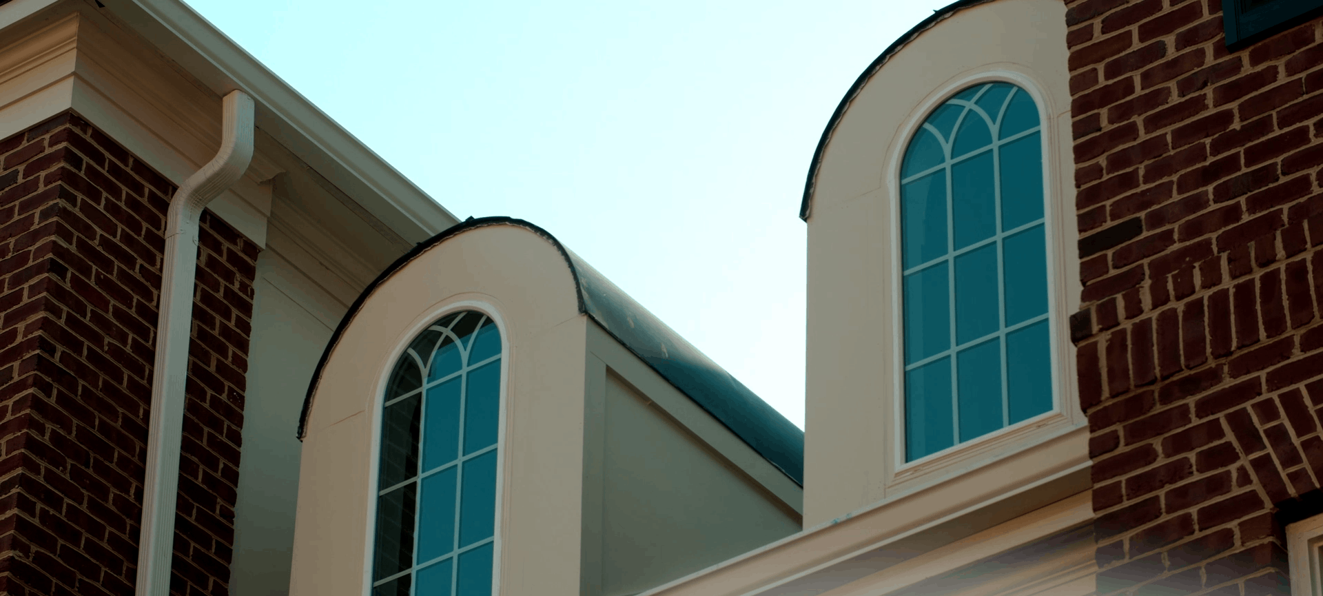 Windows shown on the second story of a home in Lorton
