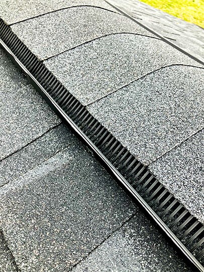 checking attic ventilation during roof inspection in Springfield, VA