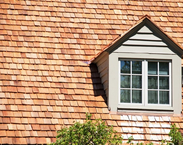 Cedar roof shown after repair services