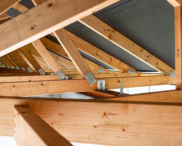 checking roof structure during roof inspection in Springfield, VA