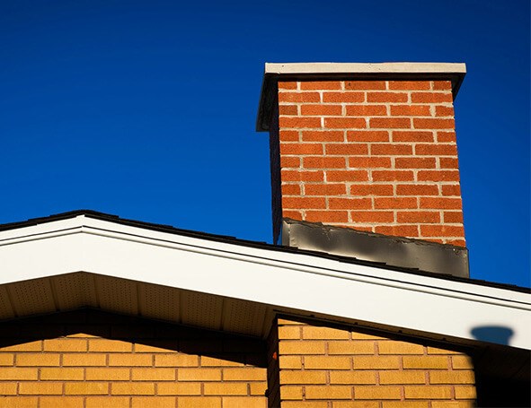 checking flashing during roof inspection in Springfield, VA