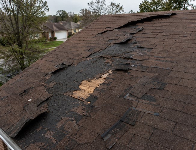 storm wind damage roof repair
