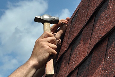 roof repairs and/or roof replacement